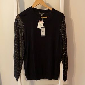 Black long sleeve with gold accent on sleeve